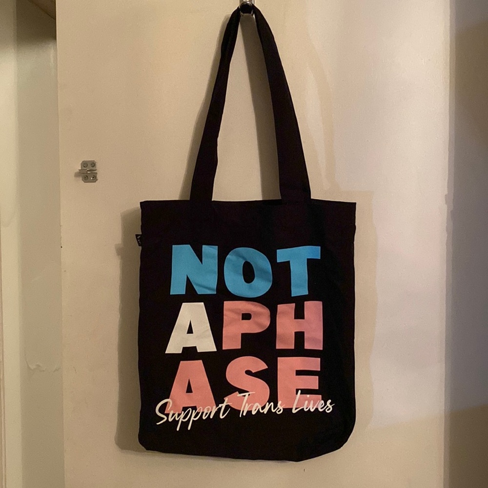 NOT A PHASE - Support Trans Rights Tote bag and Notebook